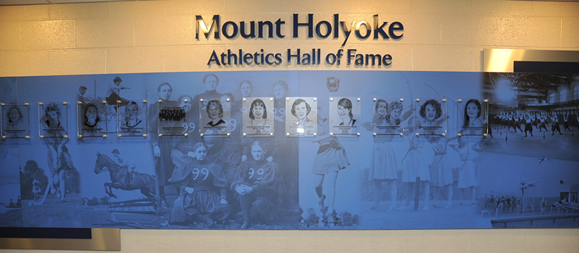 Image of the Mount Holyoke Athletics Hall of Fame Wall within the Kendall Sports & Dance Complex.