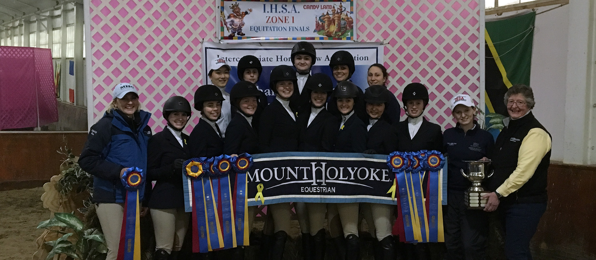 The Mount Holyoke Riding Team poses after winning the 2018 Zone 1 Championship to earn a trip to the IHSA National Championship.