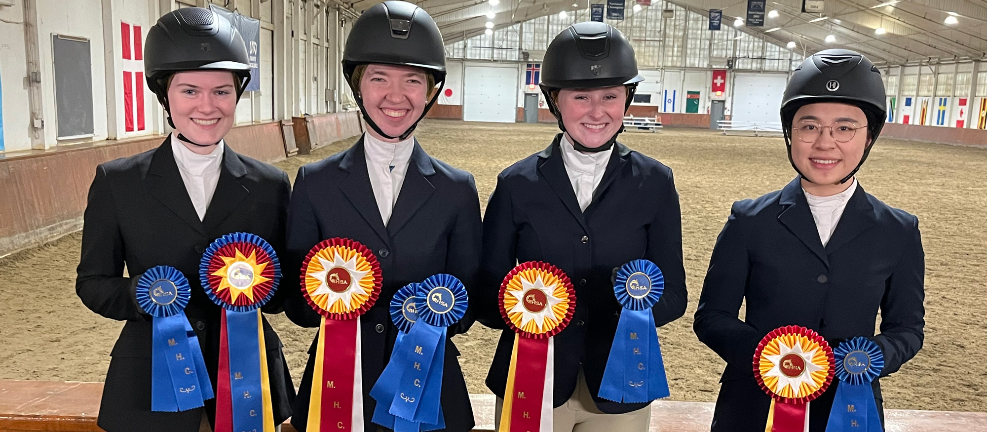 From left to right, Megan Bliamptis claimed High Point Introductory Rider honors, Emmie Mirarchi won Reserve High Point Rider honors, Mara Downie was Reserve Novice Rider, and senior Lingdang Zhang won the Reserve High Point Introductory award at the Mount Holyoke Show on March 2, 2024.