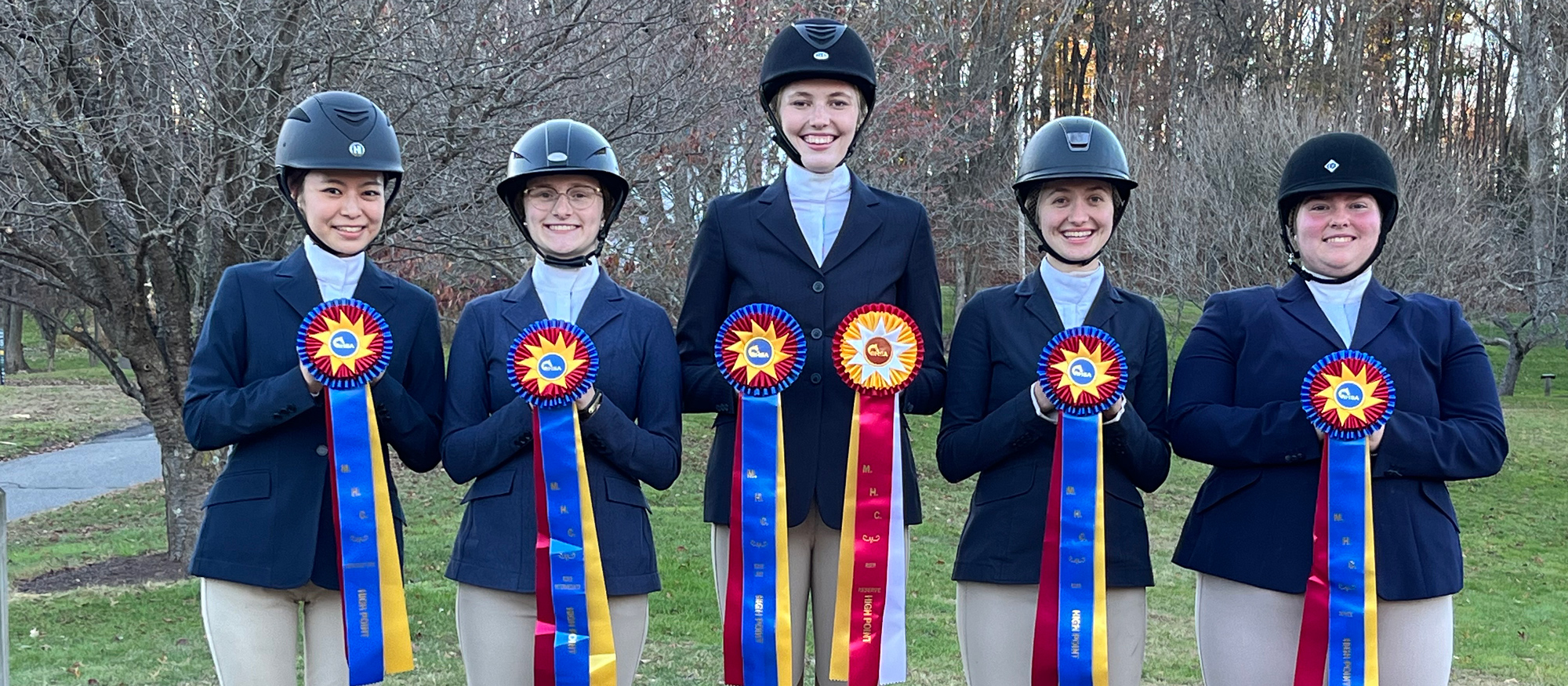Winning awards for Mount Holyoke at its second home show of the fall 2023 regular season were (left to right): Ririka Kakuta (High Point Champion Introductory Rider), Cate Bates (High Point Champion Limit Rider), Chloe McElveen (Reserve High Point Rider and the High Point Champion Limit Rider), Helena Weiss (Champion High Point Rider), and Elliott Candela (Introductory High Point Rider).