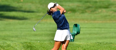 Action photo of Lyons golfer, Susan Lee.