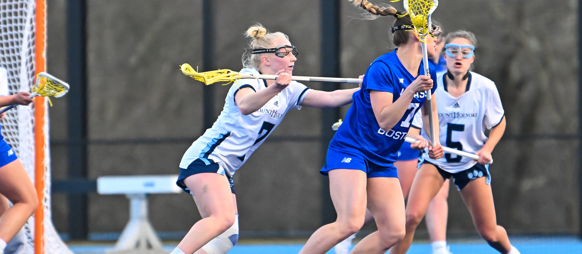 Caroline Thompson (left) and Jane Harmon (right) played key parts in a stout defensive effort by Mount Holyoke against Clark University on April 13, 2024. (RJB Sports file photo)