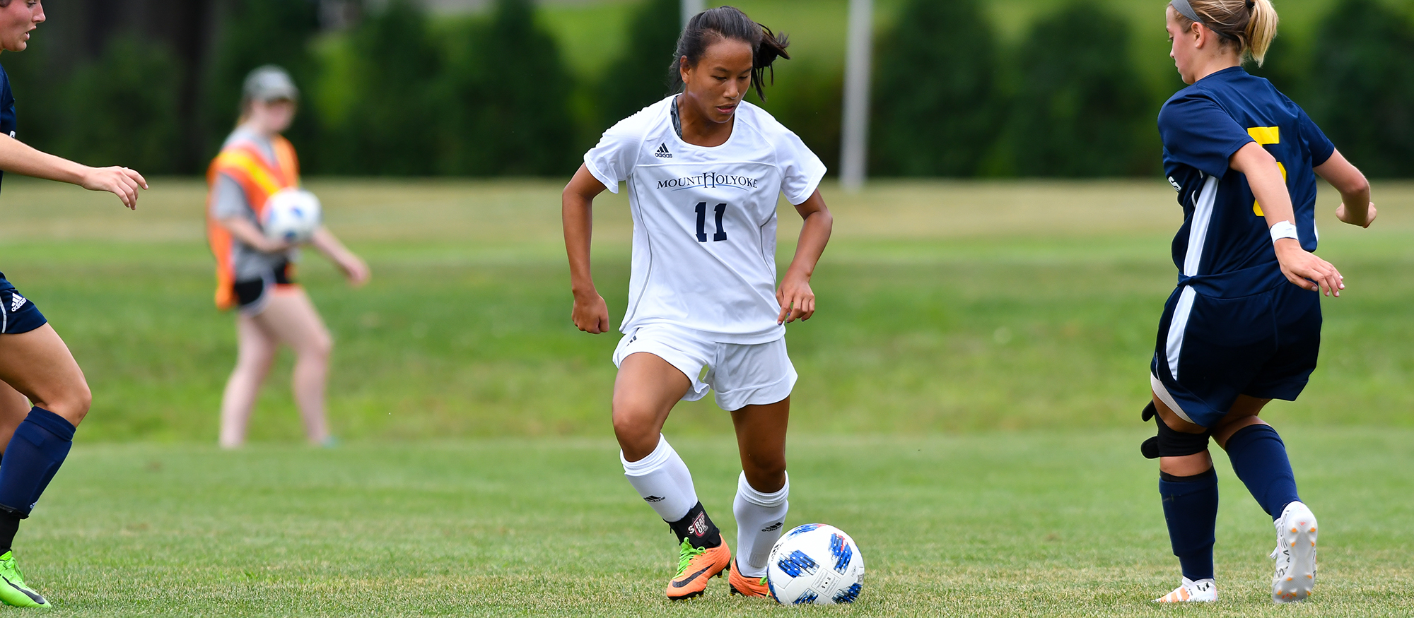 Action photo of Lyons soccer player, Hannah Finn-Erb