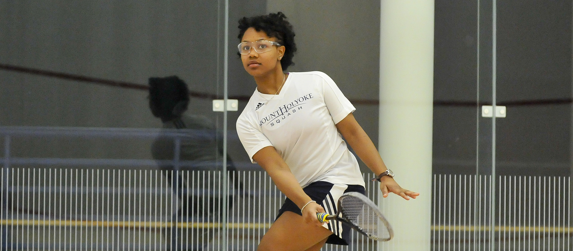 Action photo of Lyons squash student-athlete, Brandy Williamson.