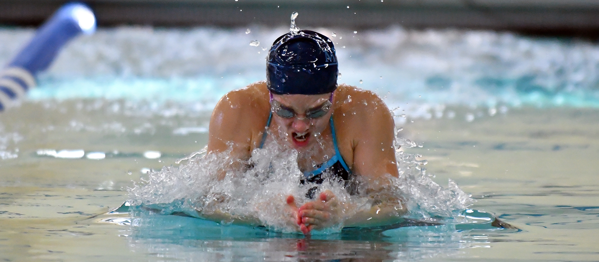 Action photo of Lyons swimmer, Bri Groves.