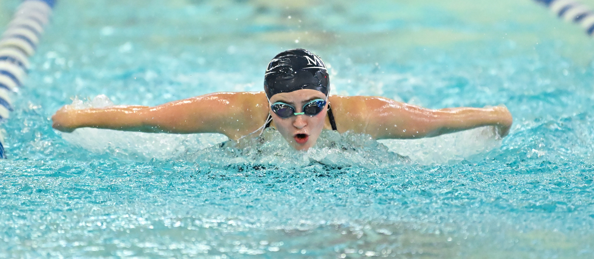 Mount Holyoke first-year Isabel Dunn placed 15th in the 100-yard butterfly at the NEWMAC Swimming & Diving Championships at MIT on Feb. 24, 2024. (RJB Sports file photo)