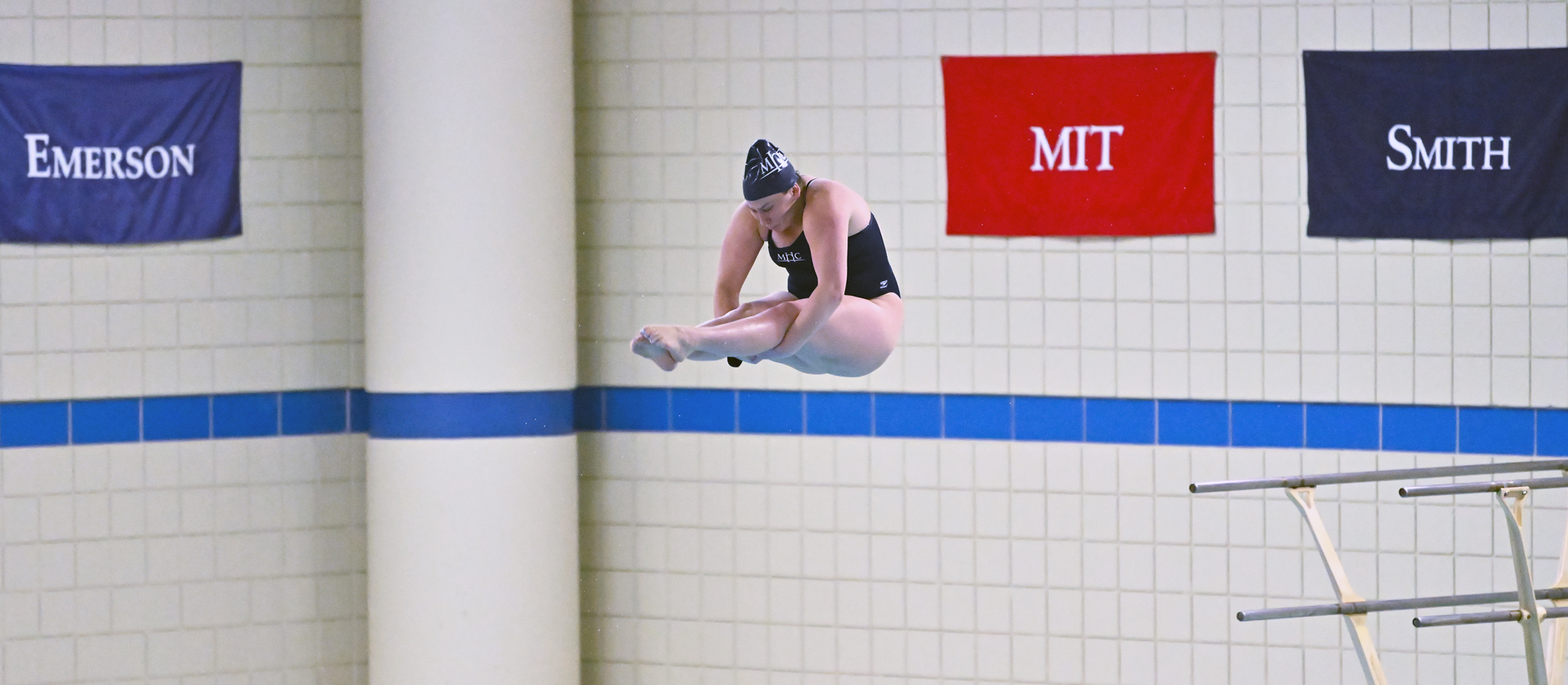 Maddy Sewell scored a career-high 487.90 points on the 3-meter diving board to take fourth place on the final day of the NEWMAC Championships at MIT on Feb. 24, 2024. (RJB Sports file photo)