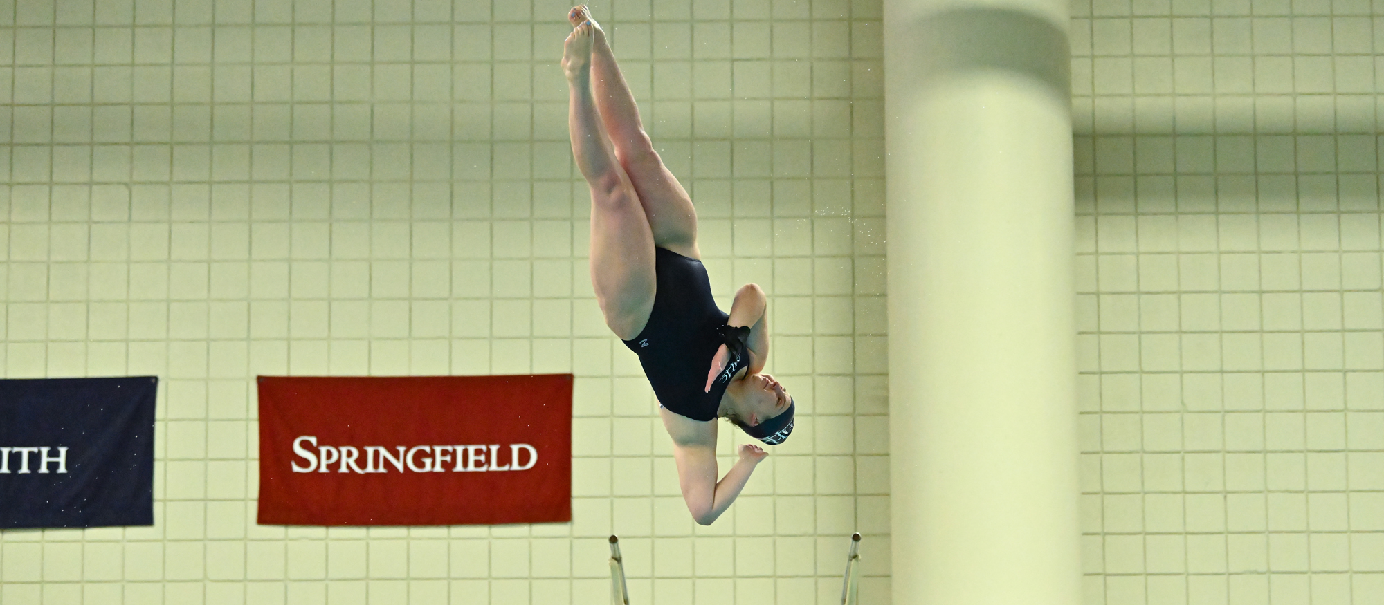 Maddy Sewell dives at NCAA Regionals at Colby College March 1-2. (RJB Sports file photo)