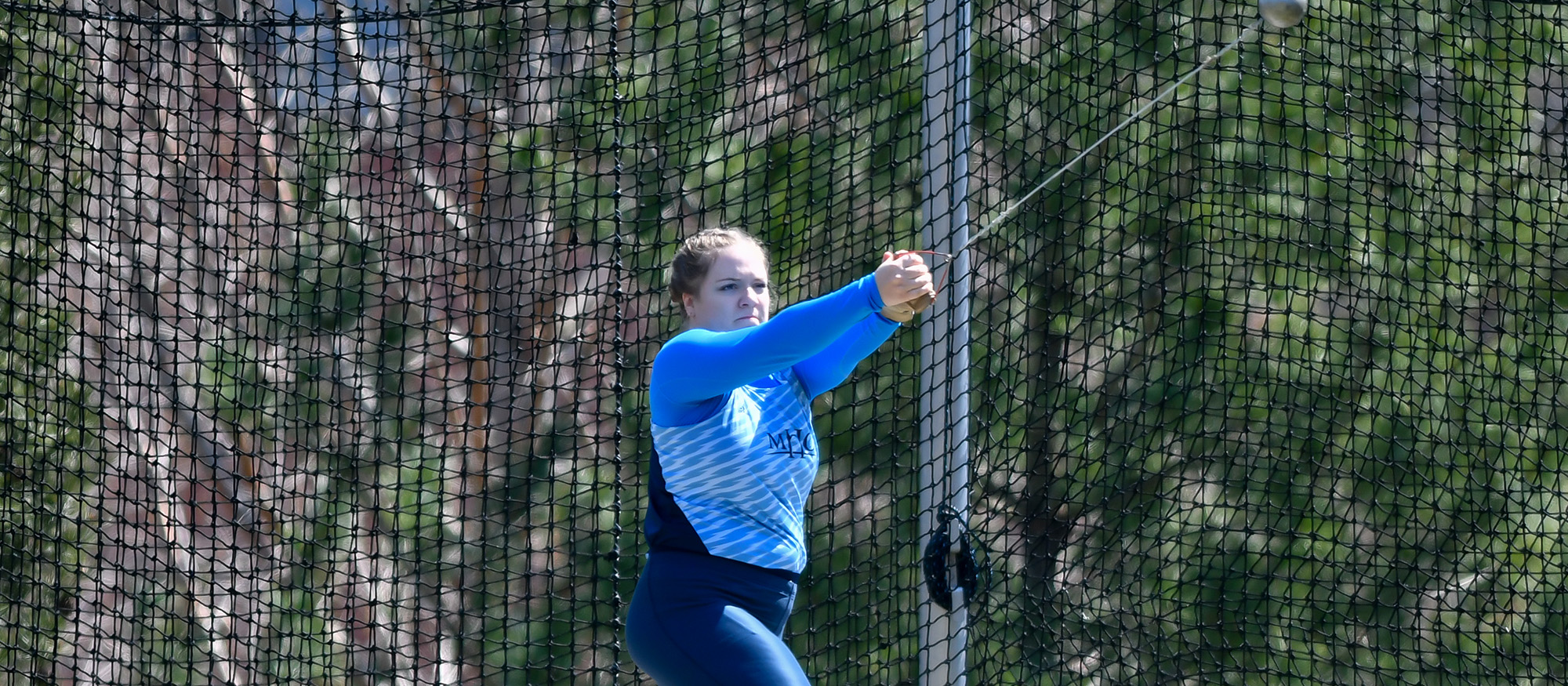 Action photo of Lyons track & field athlete, Julia Hecking.