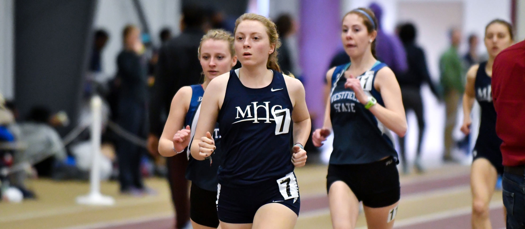 Mia Barnes indoor track and field action photo.