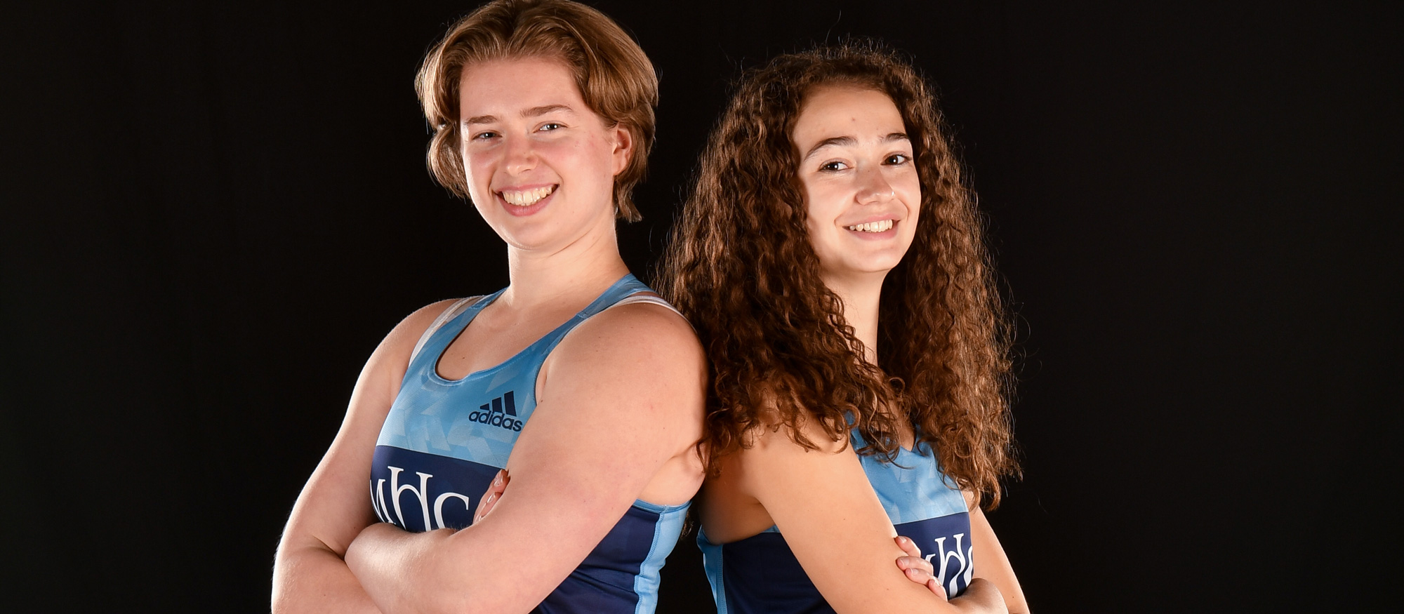 Thrower Emma Doyle (left) and sprinter/jumper Lucy Stenberg (right) captain the 2022-23 Mount Holyoke track and field team. (Bob Blanchard/RJB Sports)