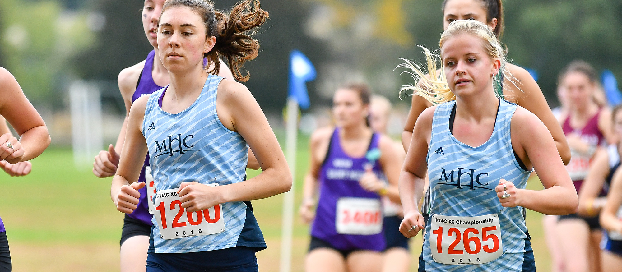 Lily Nemirovsky (left) and Greta Trapp (right) finished fourth and third for Mount Holyoke, respectively, with big personal-best times at the Purple Valley Classic on Oct. 1, 2022. (RJB Sports file photo)
