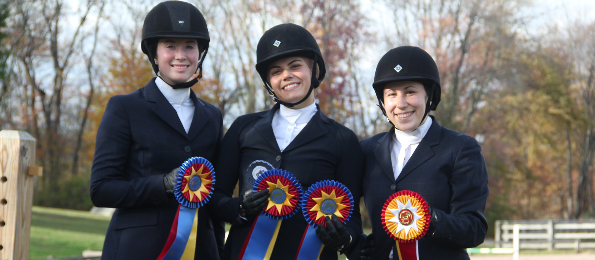 Photo featuring Lyons riders (from left to right): Anna Rzchowski, Libby Sams and Kaziah Brachfeld, who all earned individual honors at the October 28 home show at the MHC Equestrian Center.