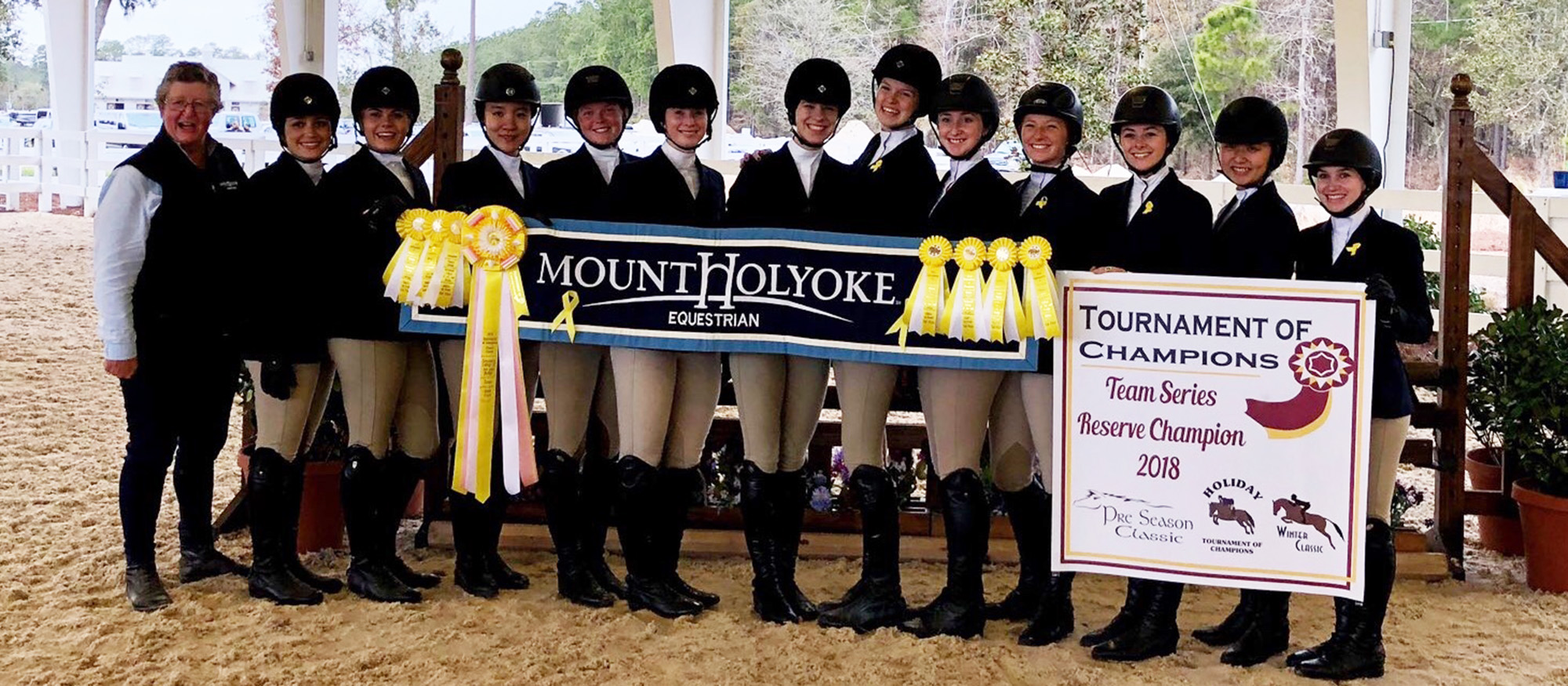 Photo of the Lyons riding team members posing after finishing third at the Winter II Tournament of Champions. MHC was the Tournament of Champions Reserve Champions for 2017-18.
