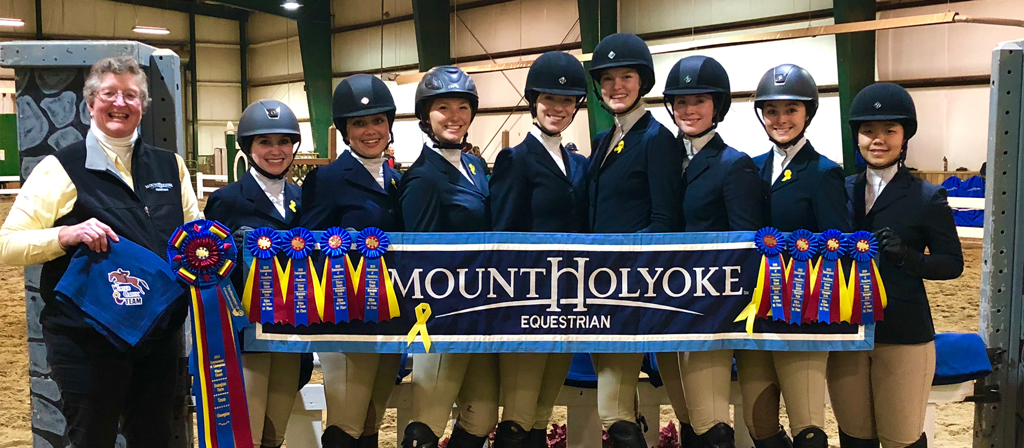 Photo of the Lyons riding team after winning the 2018 Winter I Tournament of Champions event at the Stonegate Farm on January 20, 2018.