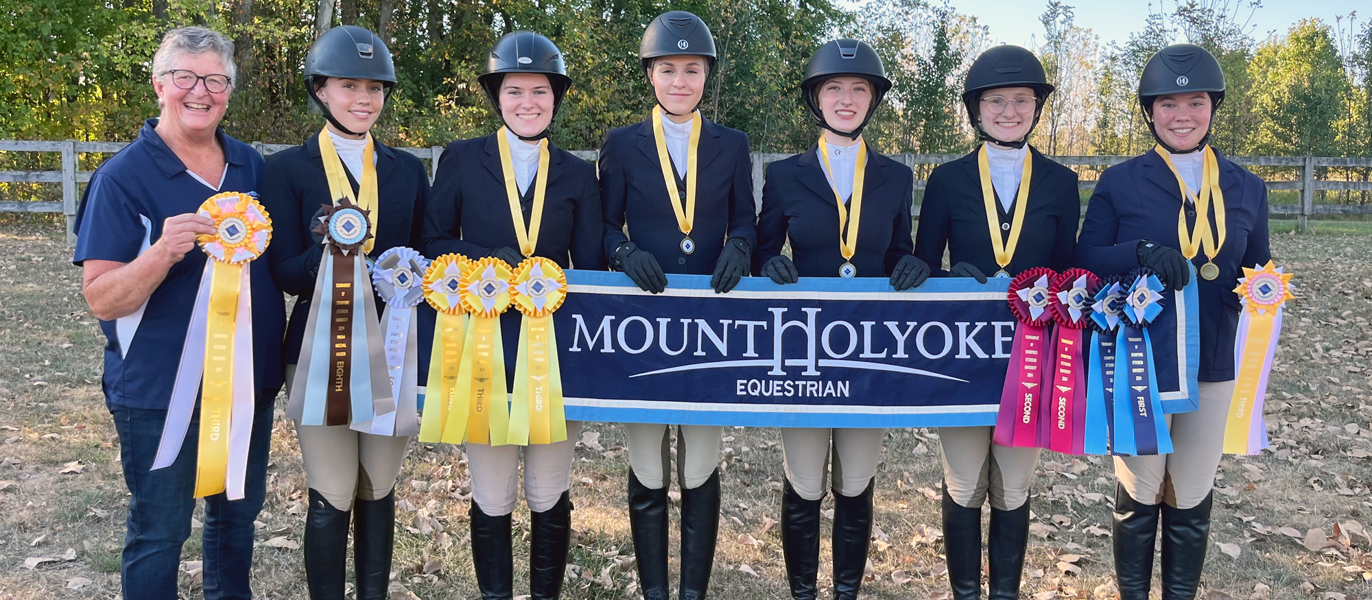 From left to right: Head coach CJ Law, Hallie Phillips, Megan Bliamptis, Kate Smith, Alyssa Martinsen, Cate Bates, Emi Graf, at the Pre-Season Tournament of Champions at Otterbein University.