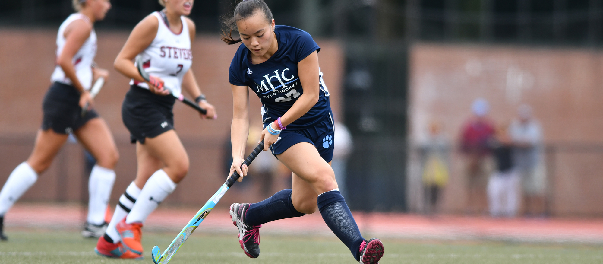 Action photo of Lyons field hockey player, Mirei Golding-Powers