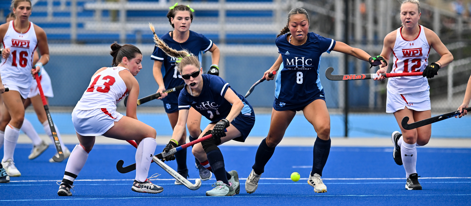 Jayonna Montigny and Diane Lee try to track down a loose ball during Mount Holyoke's game against WPI on Sept. 21, 2024. (Bob Blanchard/RJB Sports)