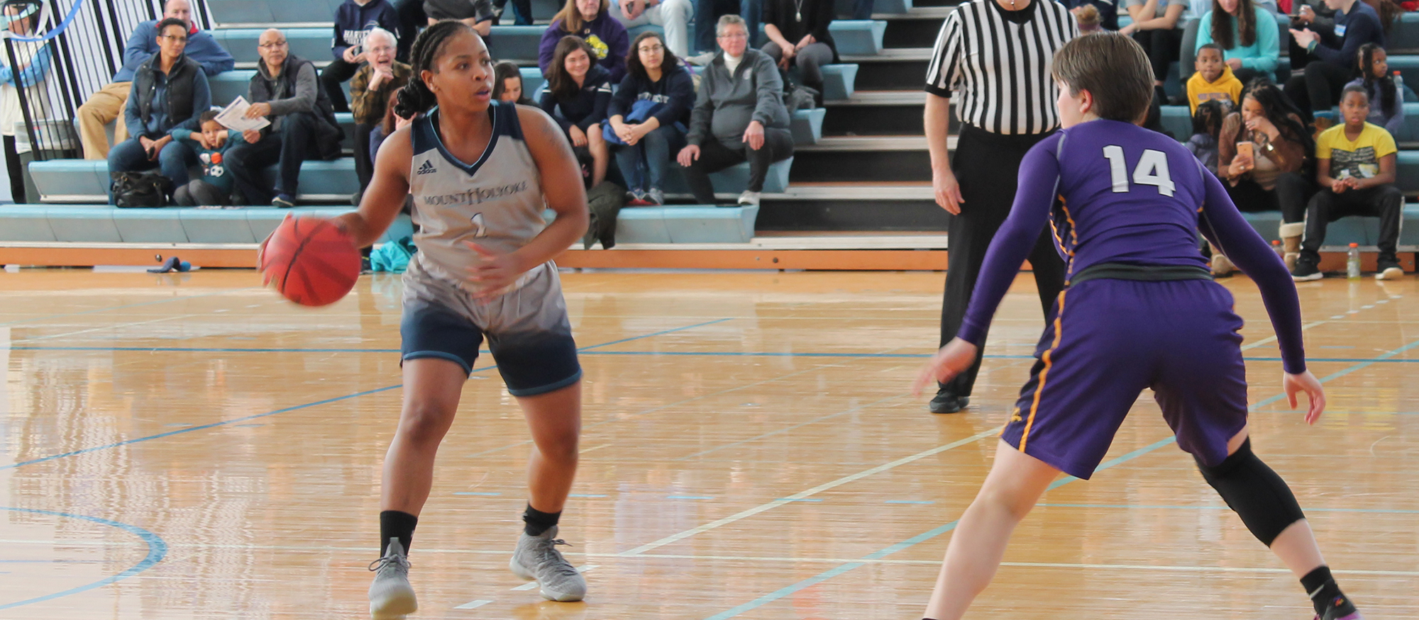 Action photo from the Feb. 16, 2019 basketball game against Emerson College of Lyons student-athlete Zahkeyah Allen.