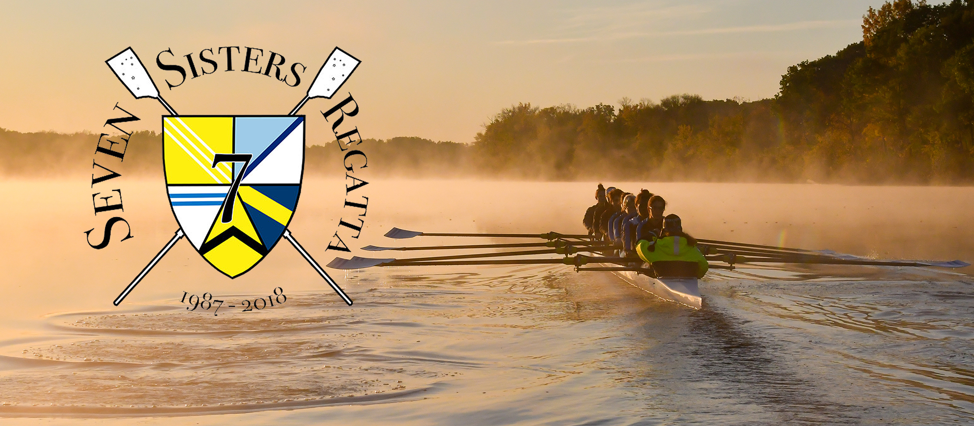 Image of the Lyons rowing team on the water, also featuring the 2018 Seven Sisters Regatta logo, courtesy of Wellesley College.