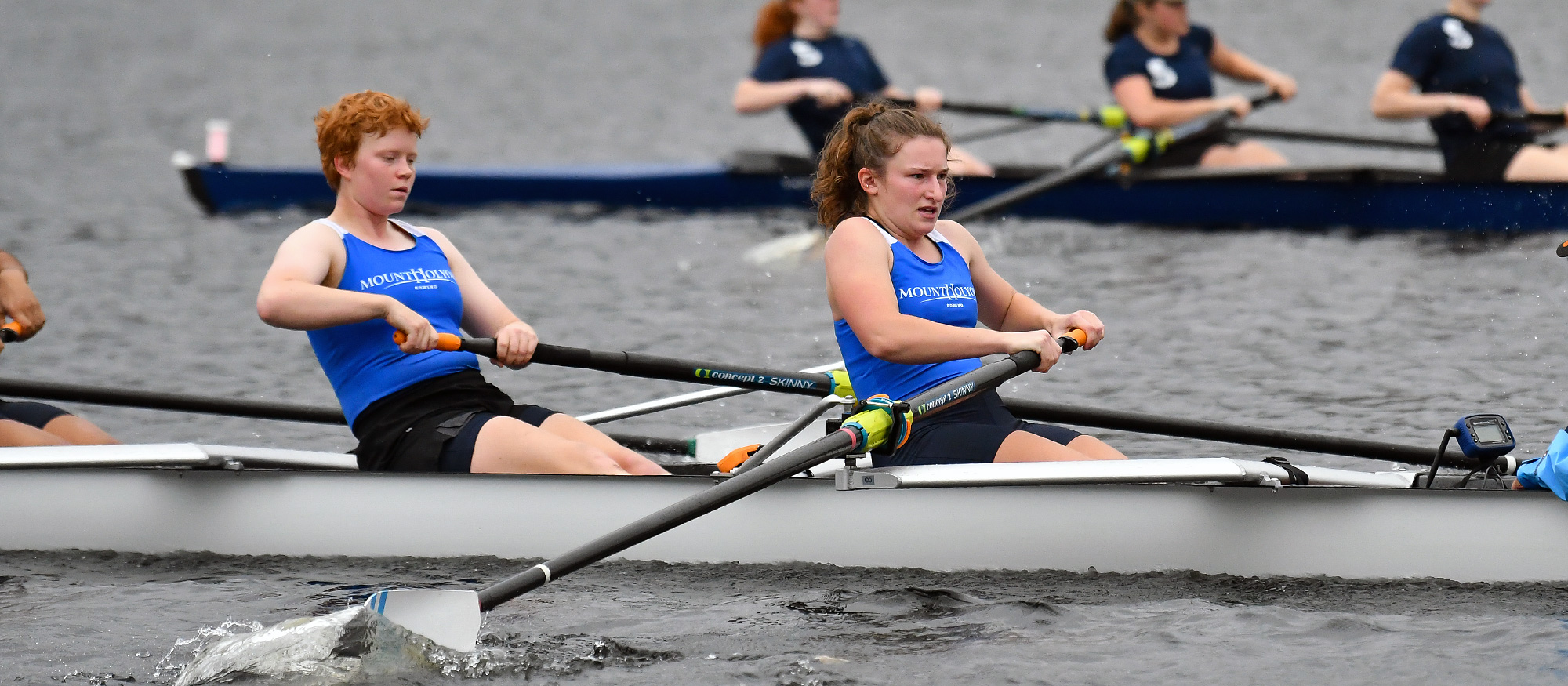 Emma Waldron (left) and Celeste Keep (right) helped Mount Holyoke's first varsity eight finish 11th out of 31 boats at the Head of the Riverfront regatta in Hartford, Conn., on Oct. 2, 2022. (RJB Sports file photo)