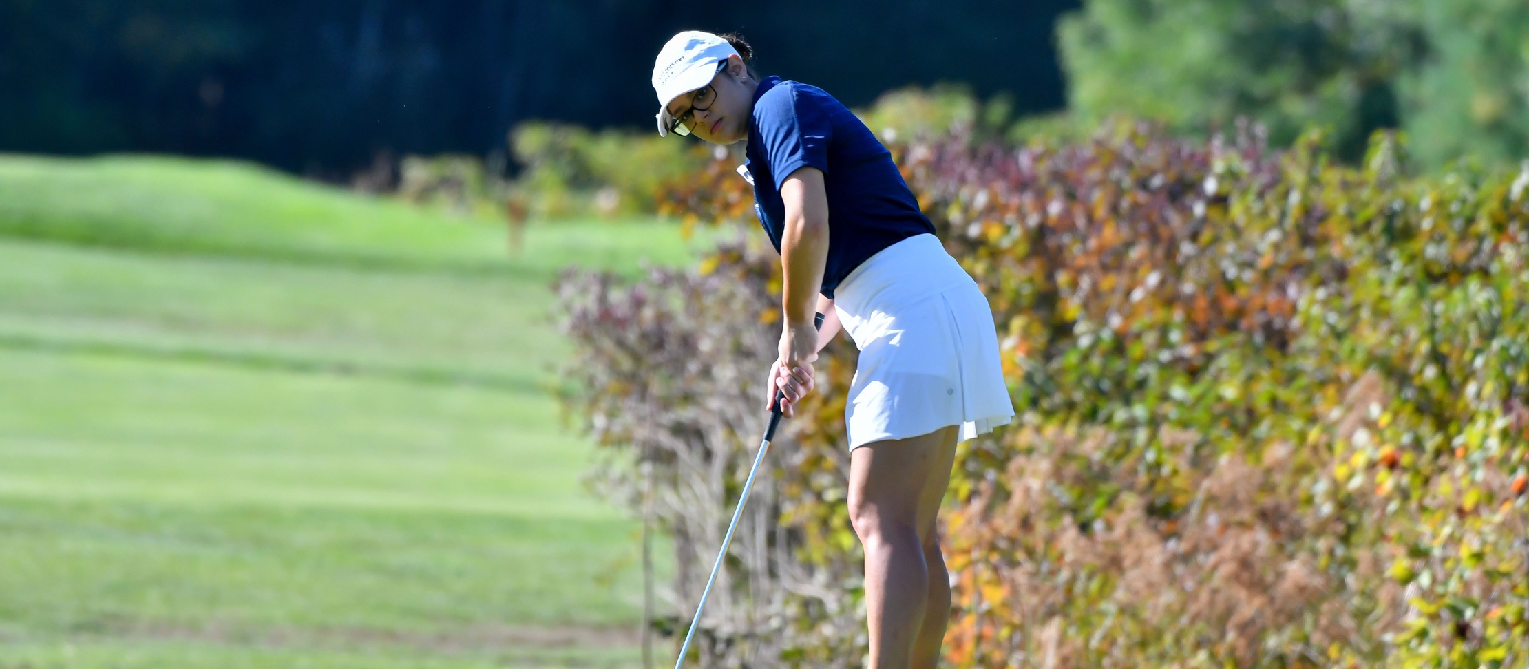 Action photo of Lyons golf player Stephanie Spitzer.