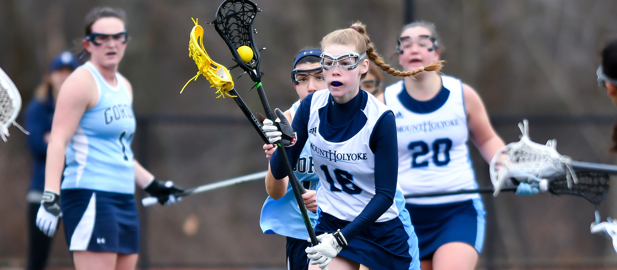 Action photo of Lyons lacrosse player, Haley Subocz.