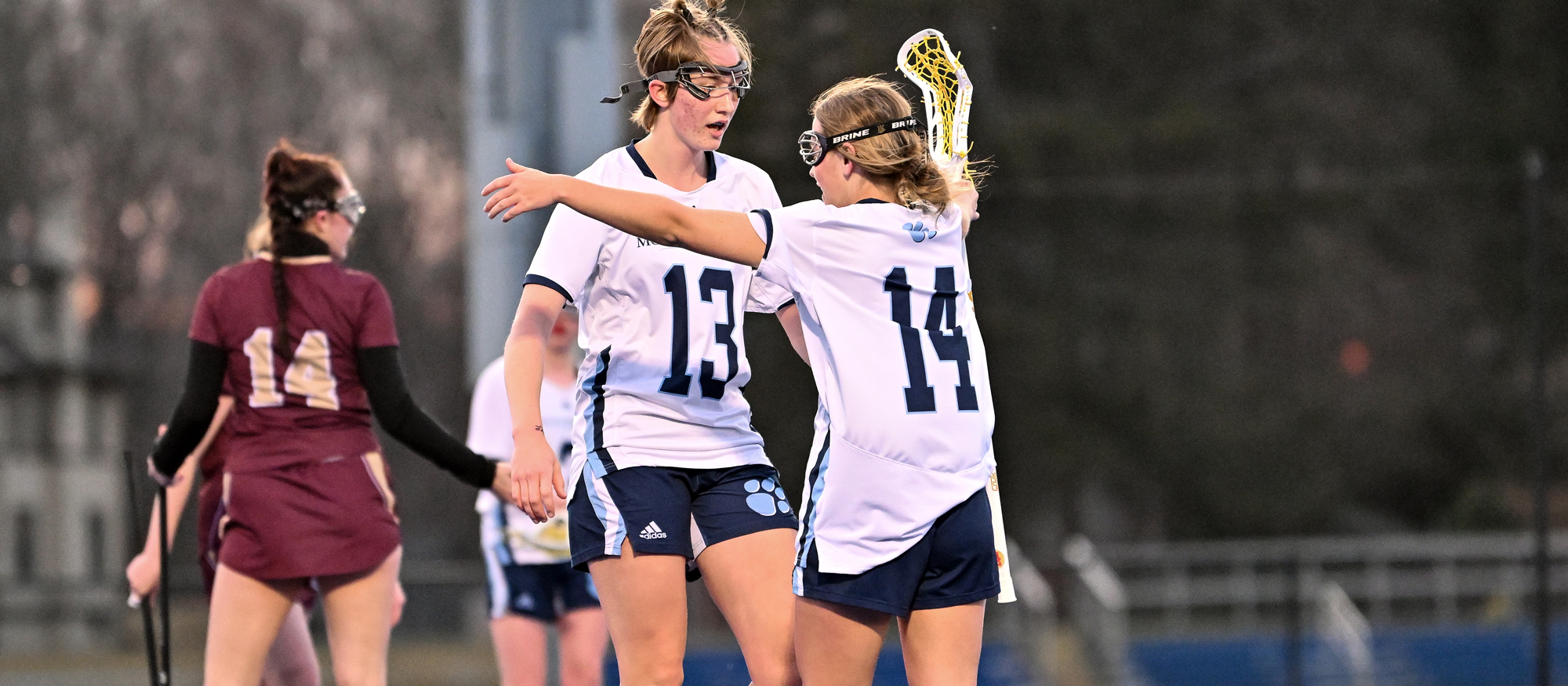 Amelia Knaysi (left) scored two goals with seven ground balls and three caused turnovers, and Emi Bisson (right) scored her 40th goal of the season in Mount Holyoke's loss at Coast Guard on April 19, 2023. (RJB Sports file photo)