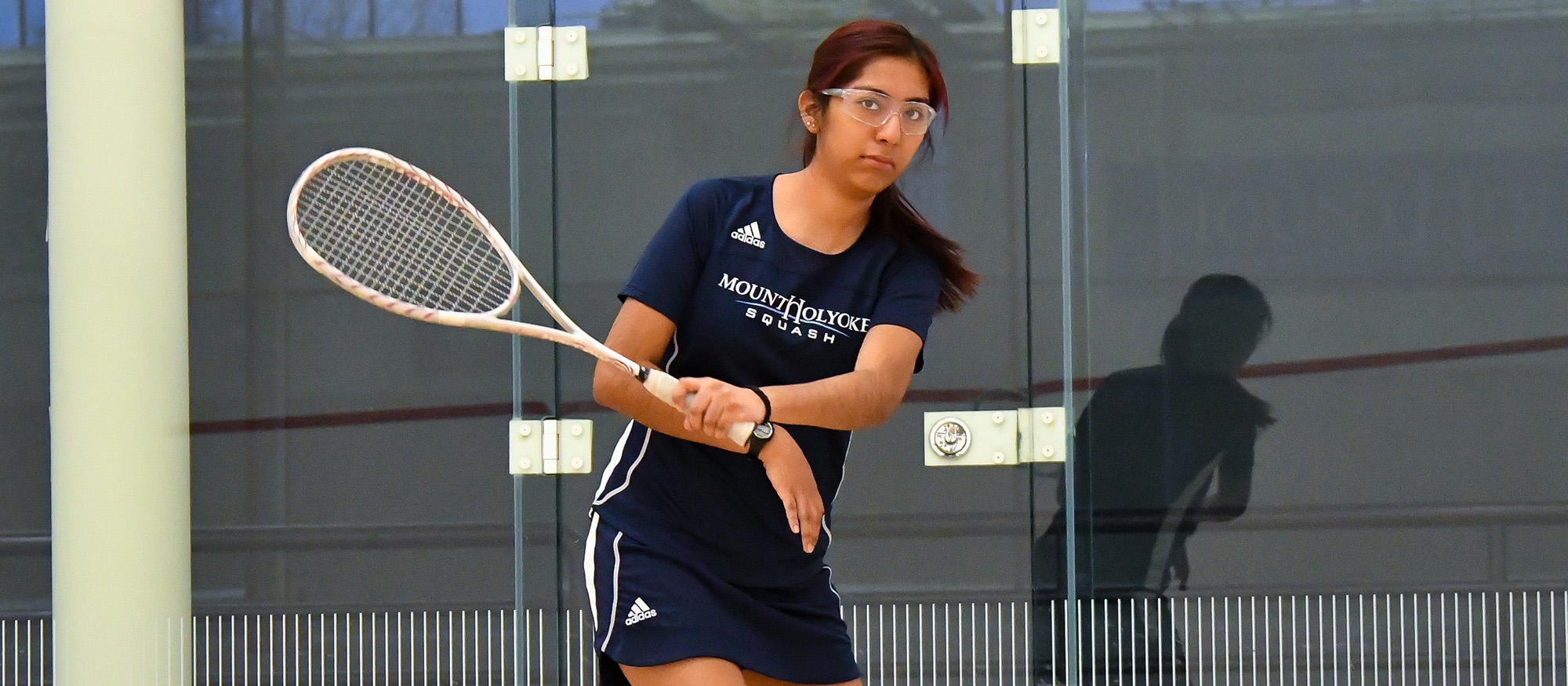 Action photo of Lyons squash player, Genesis Lara Granados.