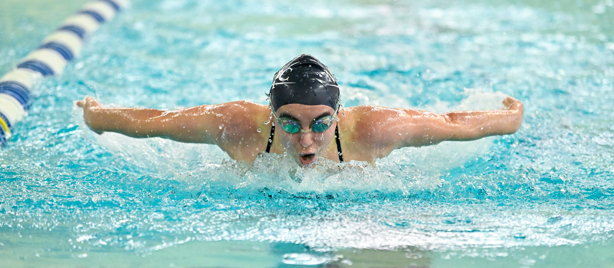 Isabel Dunn took 15th place in the finals of the 100 butterfly at the NEWMAC Championships on Feb. 22, 2025. (RJB Sports file photo)