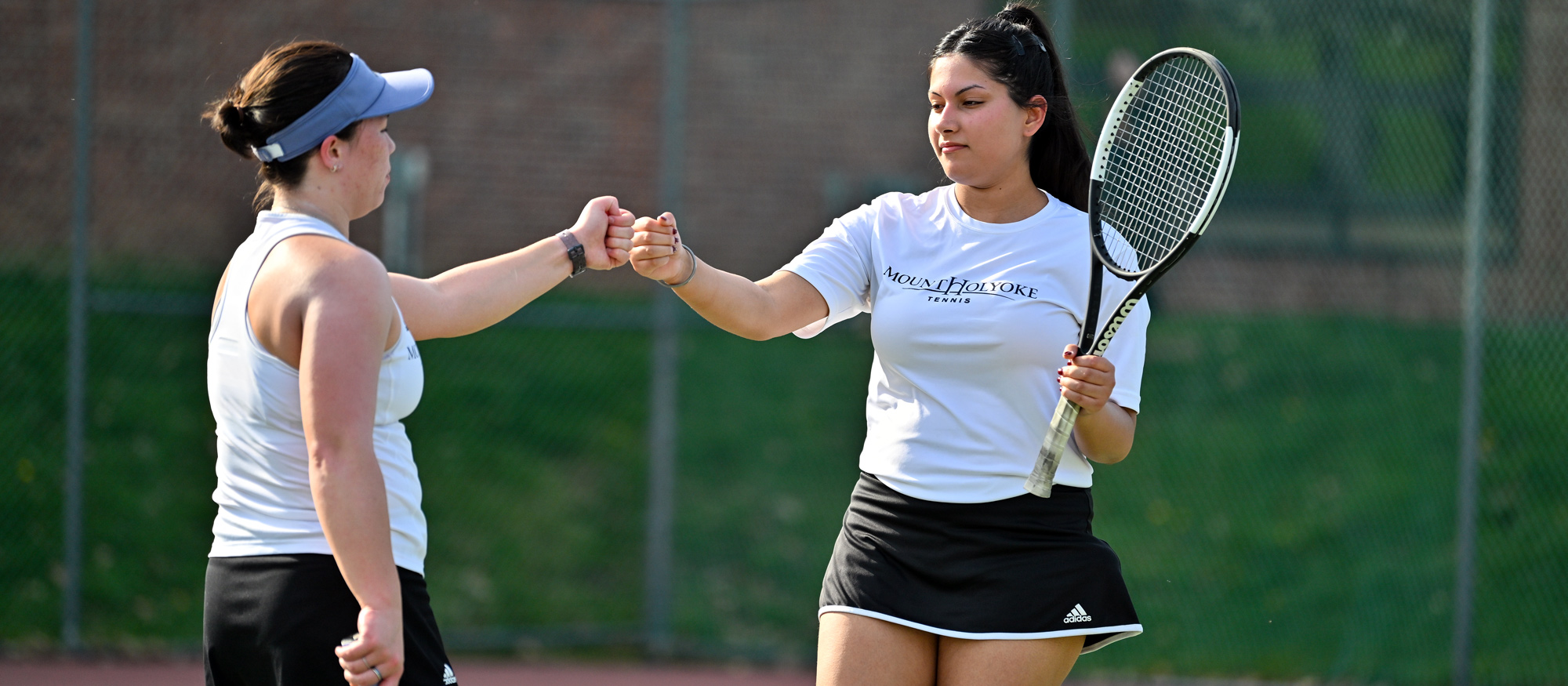 Annika Chai (left) and Jaskirat Kaur (right) won 8-6 at No. 1 doubles in Mount Holyoke's 5-4 loss to Springfield on April 18, 2023. (RJB Sports file photo)