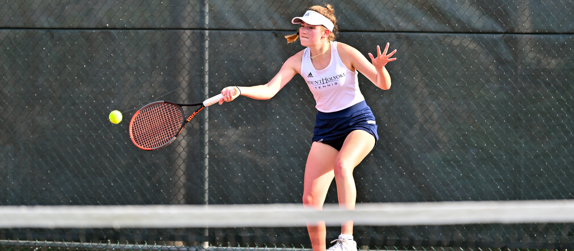 Kate Vavra won a point for Mount Holyoke with a third-set tiebreaker win at fifth singles against Connecticut College on March 22, 2023. (RJB Sports file photo)