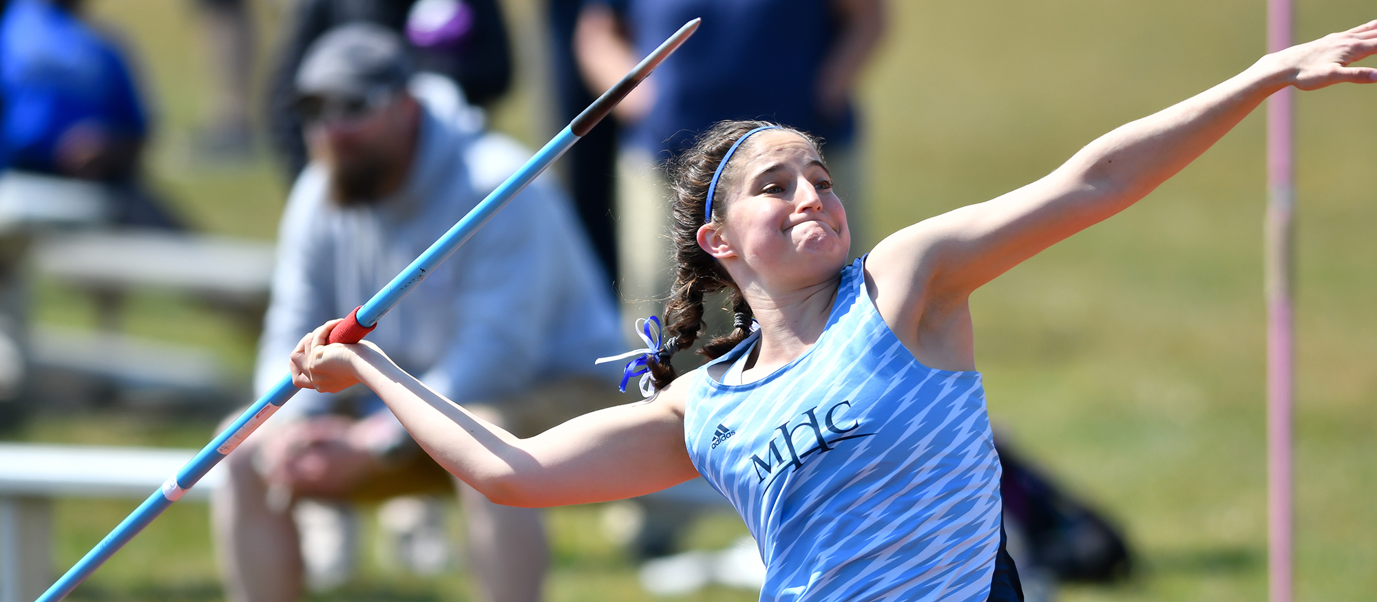 Action photo of Lyons track & field athlete, Ireland Clare Kennedy competing in the javelin.