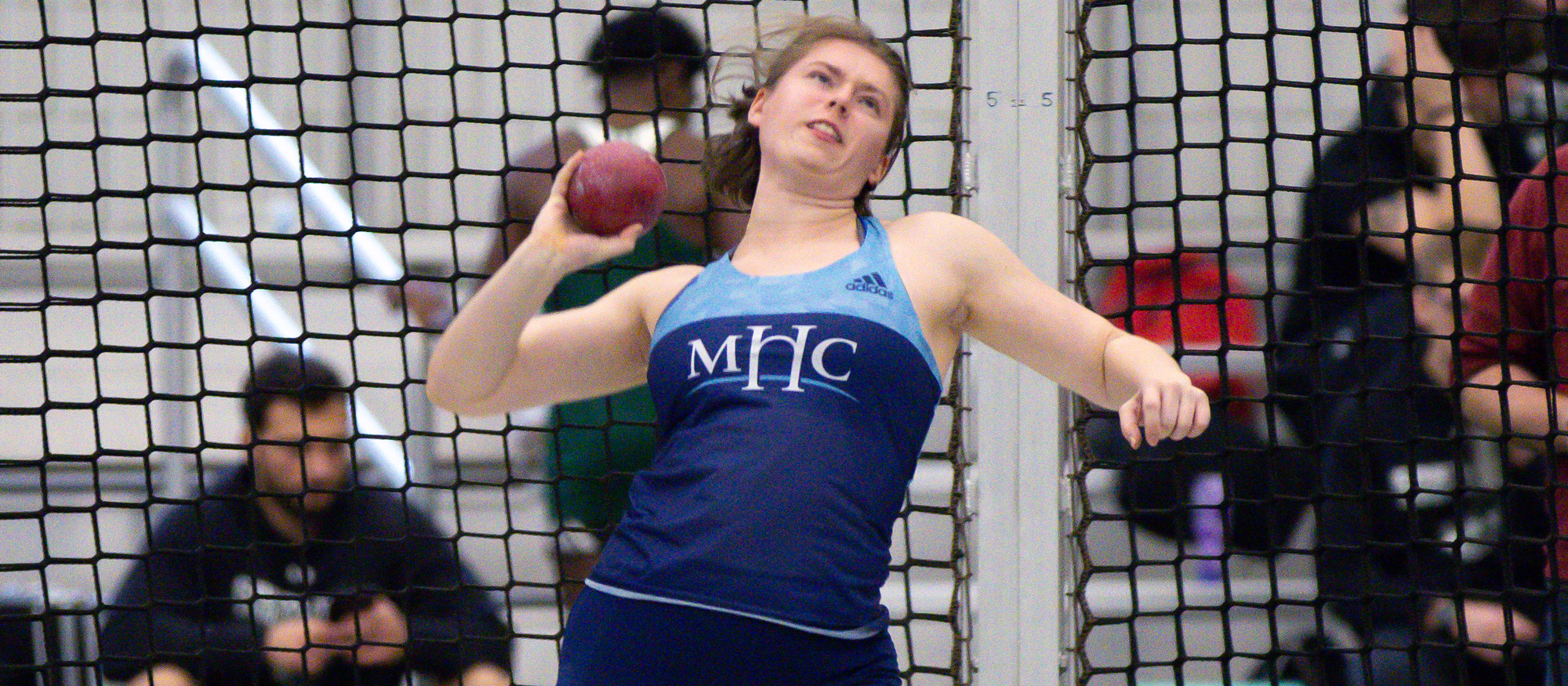 Emma Doyle moved into fourth place on Mount Holyoke's all-time performance list in the shot put on Dec. 3, 2022. (Bob Blanchard/RJB Sports)
