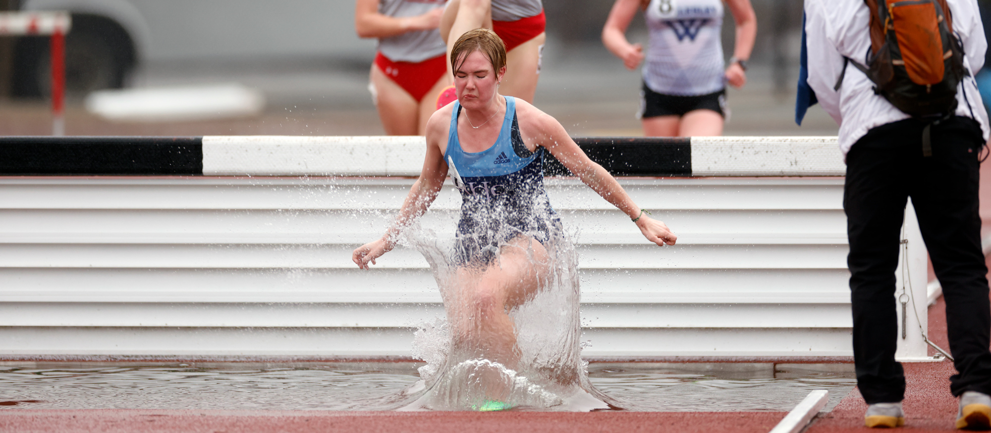 Tessa Lancaster broke her own team record in the 3,000-meter steeplechase on April 30, 2023 at the NEWMAC Championships at MIT, with a time of 11:36.54. (Frank Poulin/Courtesy of MIT)