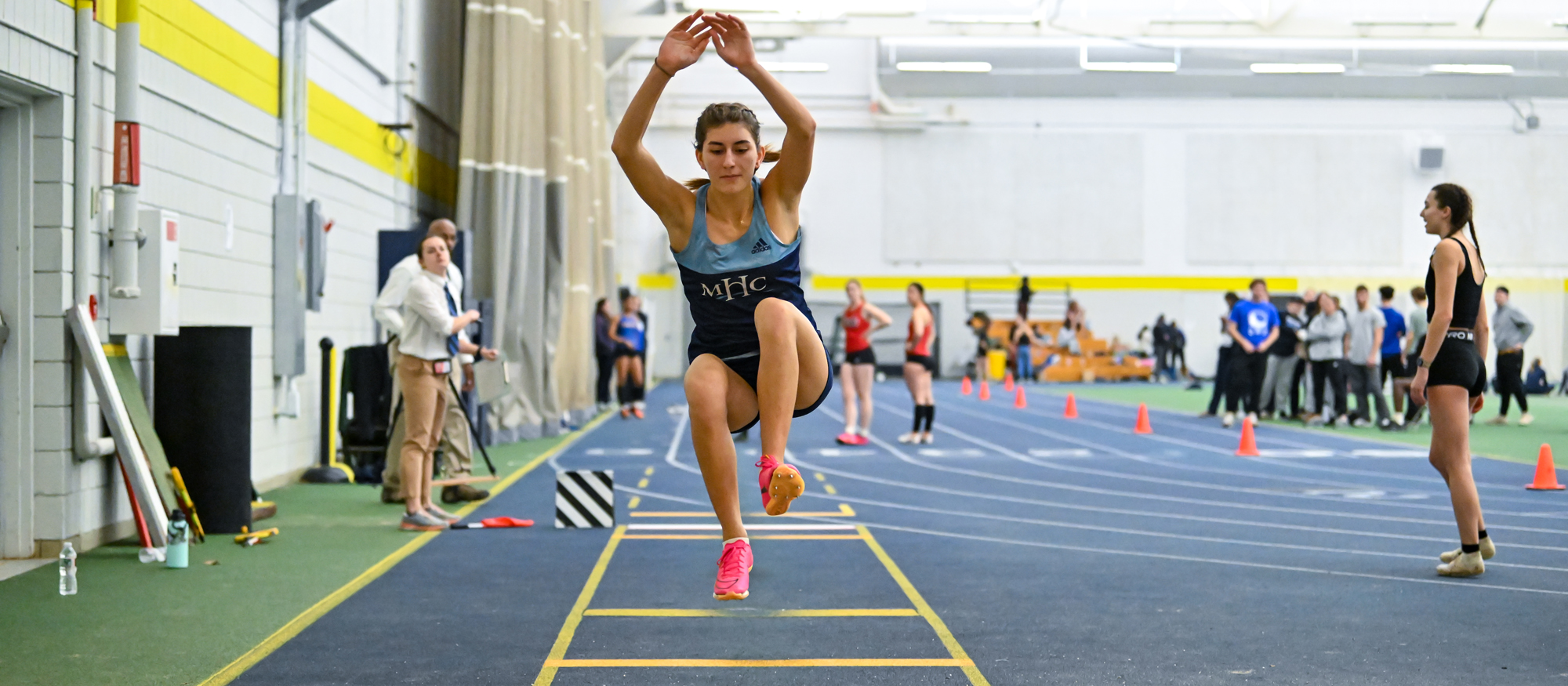 Ioanna Tsoni, shown competing in the triple jump earlier this season, set Mount Holyoke's indoor long jump record at 17 feet and 11 inches at the Tufts Cupid Challenge on Feb. 3, 2024. (RJB Sports file photo)